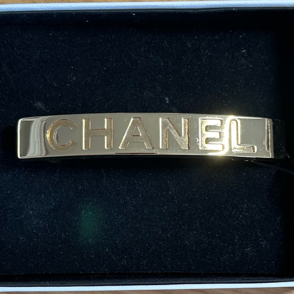 CHANEL - LOGO, GOLD PLATED HAIR CLIP, NEW IN BOX & TAGS - COLLECTABLE
